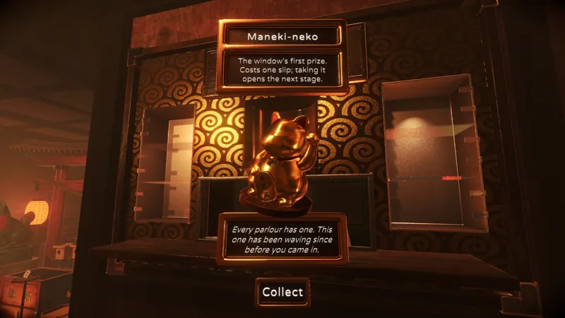 The maneki-neko in the prize window